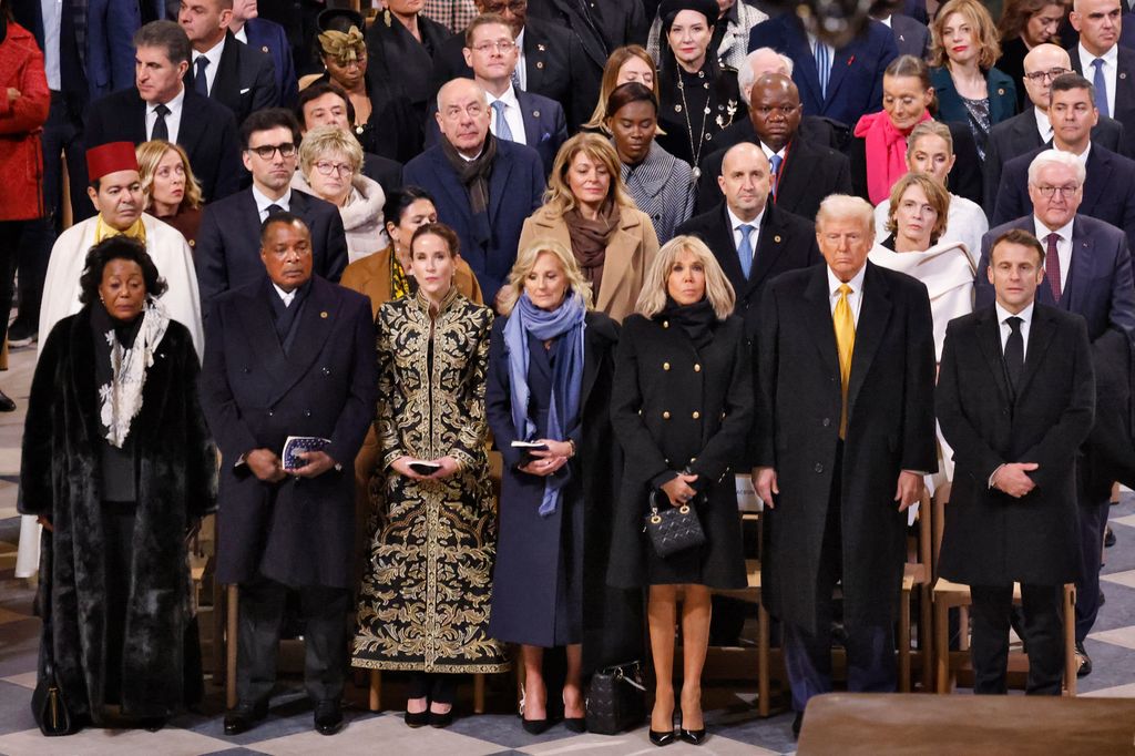 Congo's President Denis Sassou Nguesso and his wife Antoinette Sassou Nguesso, Ashley Biden, First Lady of the United States Jill Biden, Brigitte Macron, US President-elect Donald Trump and French President Emmanuel Macron stand during a ceremony