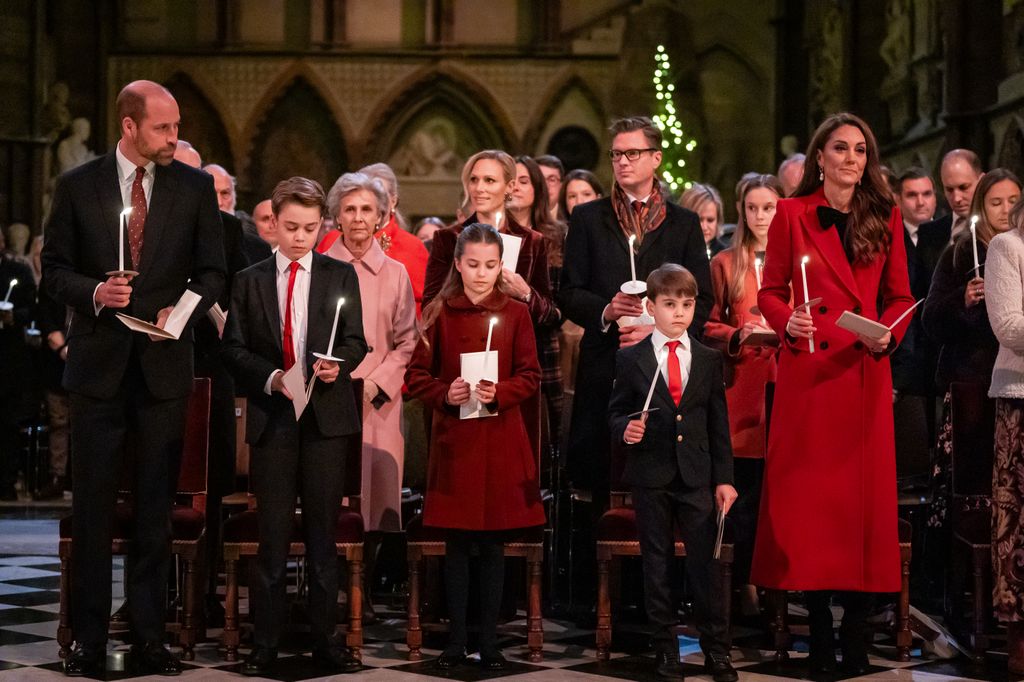 The Prince of Wales, Prince George, Princess Charlotte, Prince Louis and Catherine, Princess of Wales during the 'Together At Christmas' Carol Service at Westminster Abbey