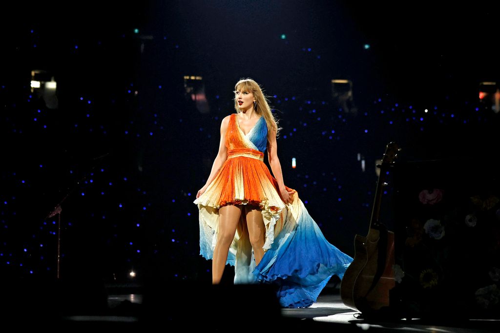 Taylor Swift on stage gazing at the audience