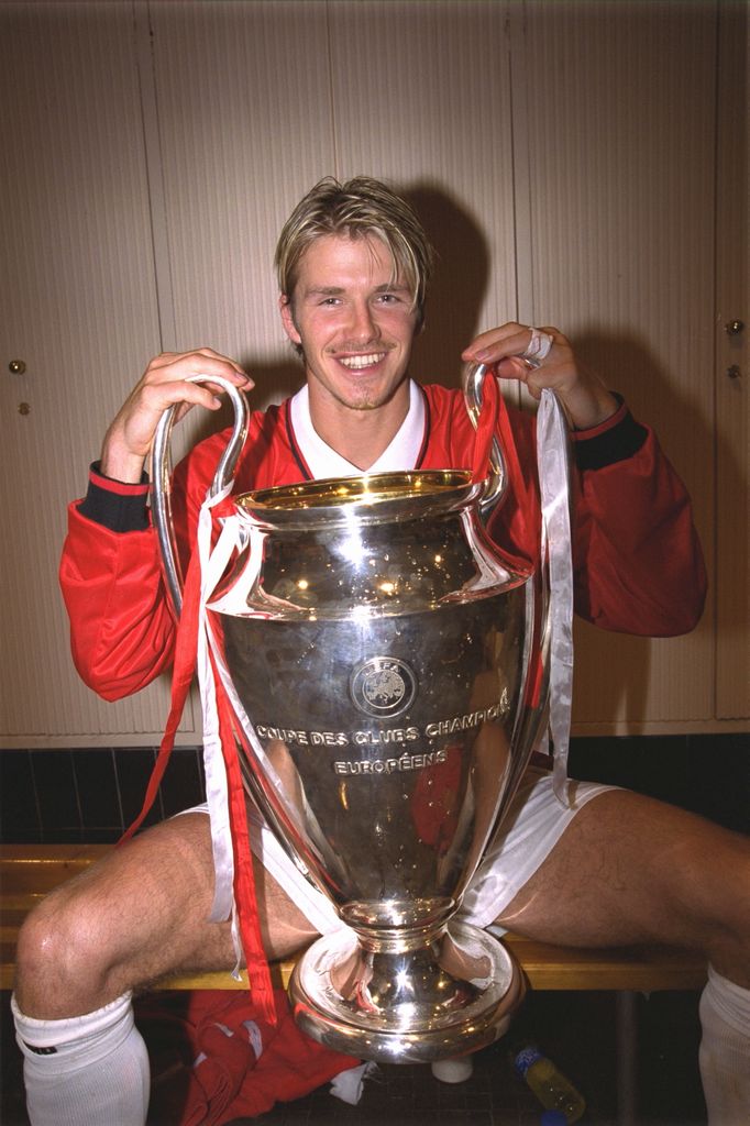 David Beckham with the European Cup in the dressing room after the UEFA Champions League Final in 1999