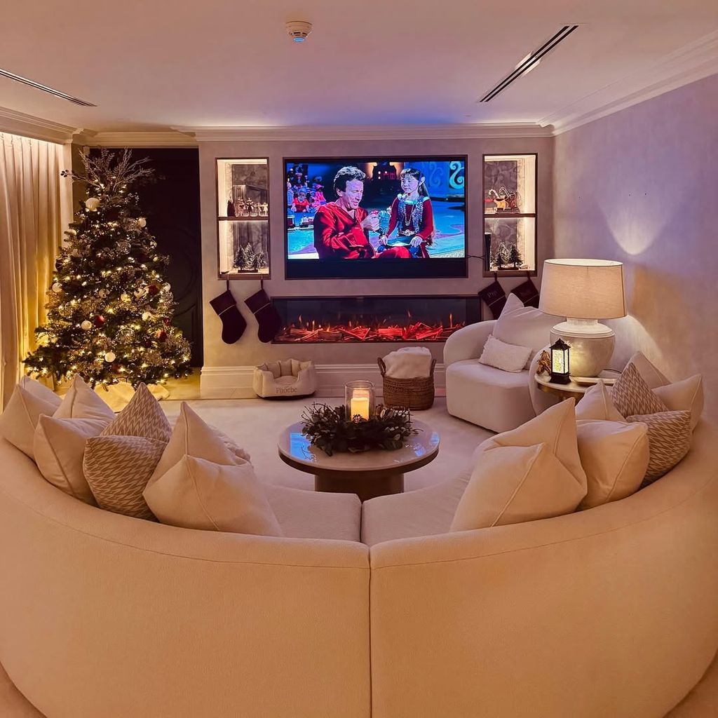 Cosy TV room showing christmas movie at Michelle Keegan's home