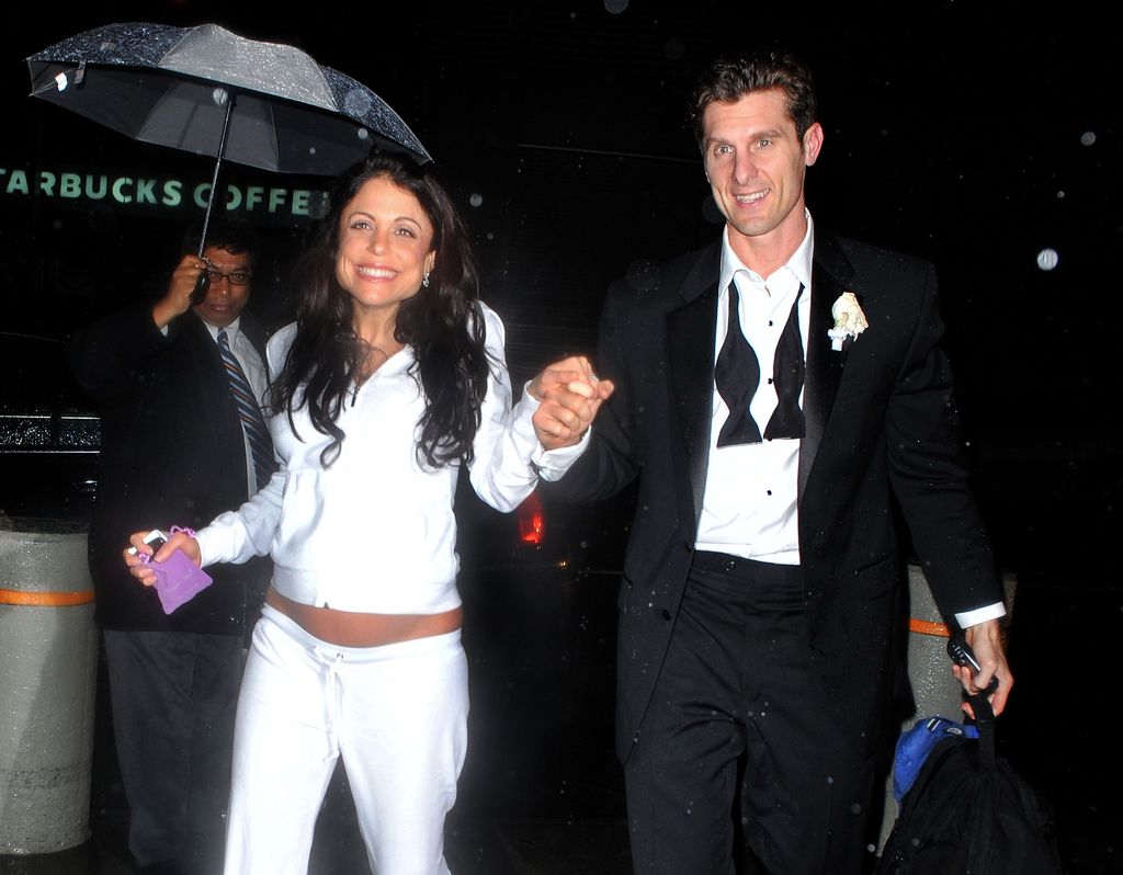 Bethenny Frankel and Jason Poppy arrive at their hotel after their wedding at Four Seasons Restaurant on March 28, 2010 in New York