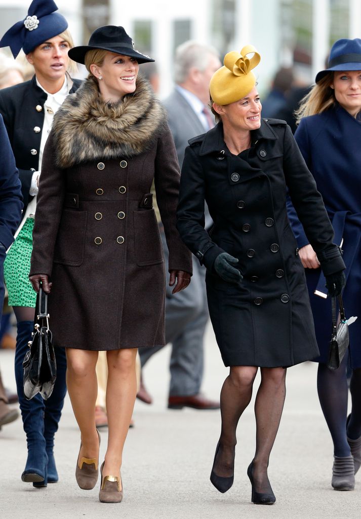 Zara Phillips and Dolly Maude walk in coats and hats