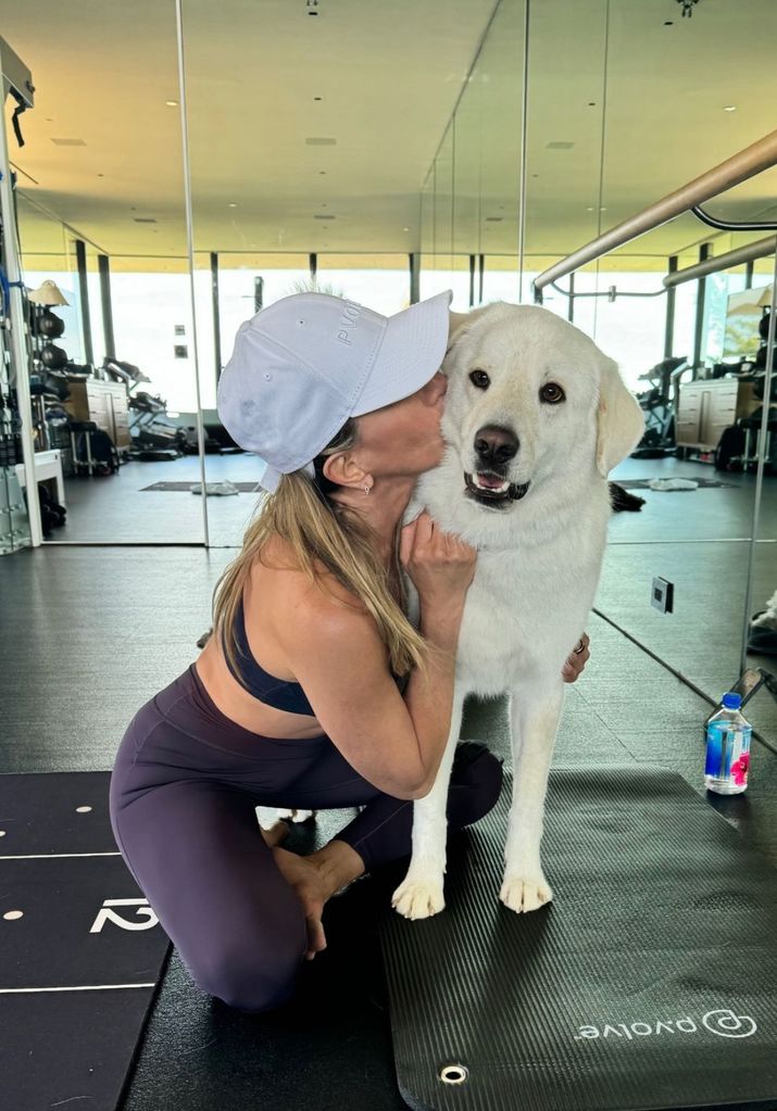 Photo shared by Jennifer Aniston featuring her dog Lord Chesterfield while working out