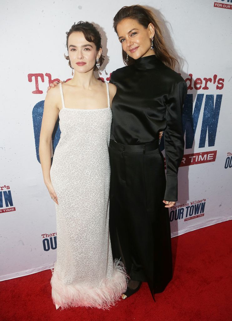 Zoey Deutch and Katie Holmes pose at the opening night of the revival of "Our Town" on Broadway at The Barrymore Theatre on October 10, 2024 in New York City