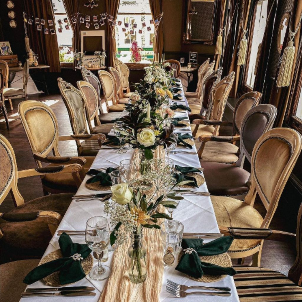 inside pub with long decorated table