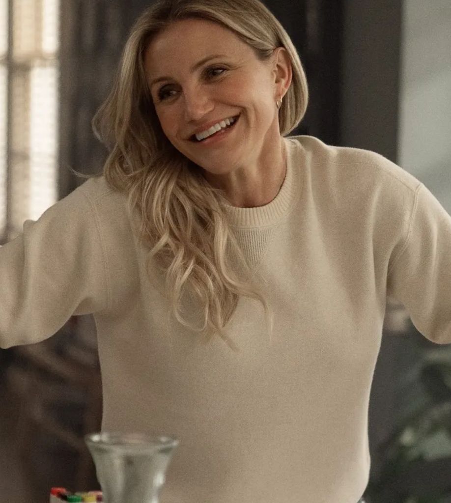 Cameron Diaz wearing a cream sweater in Back In Action