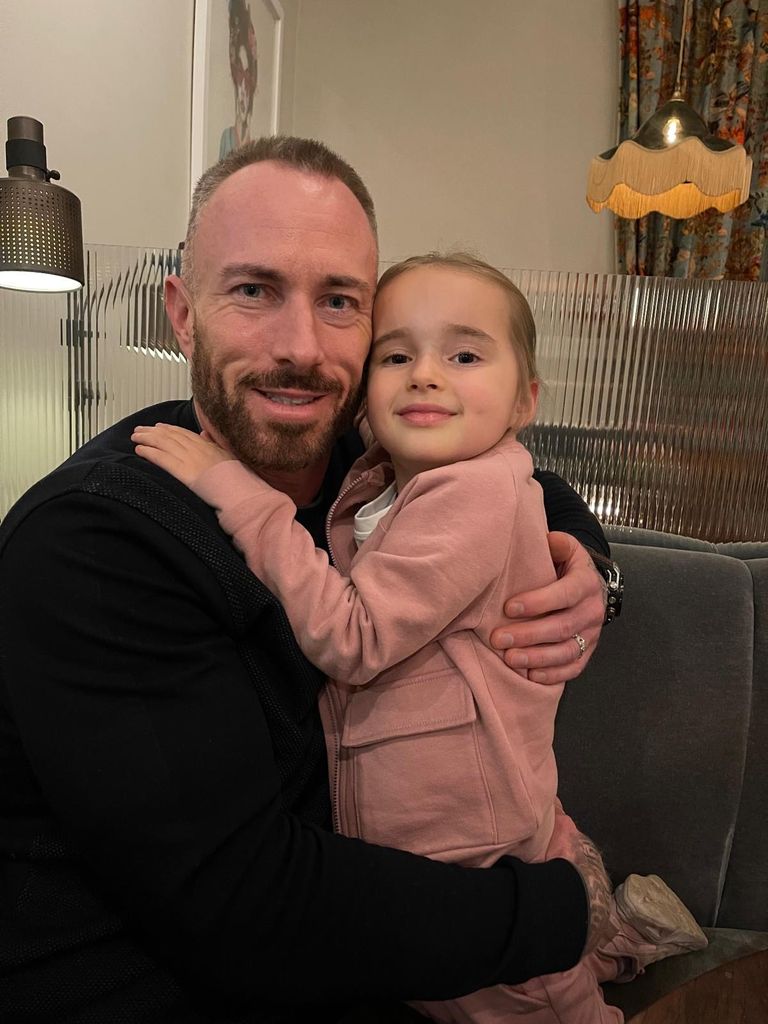 James and his daughter, Ola cuddle up for a photo