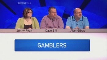 Three people sitting on game show panel