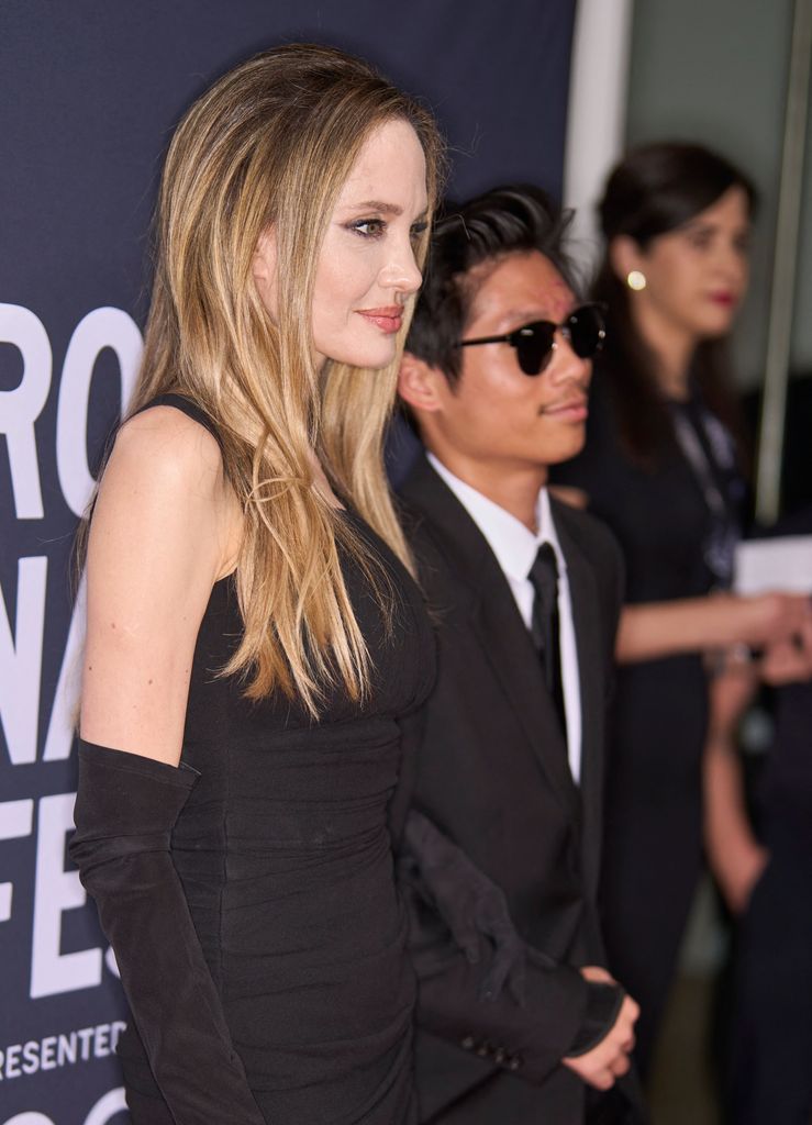 US director Angelina Jolie and her son Pax Jolie-Pitt attend the world premiere of Without Blood at TIFF Lightbox theatre