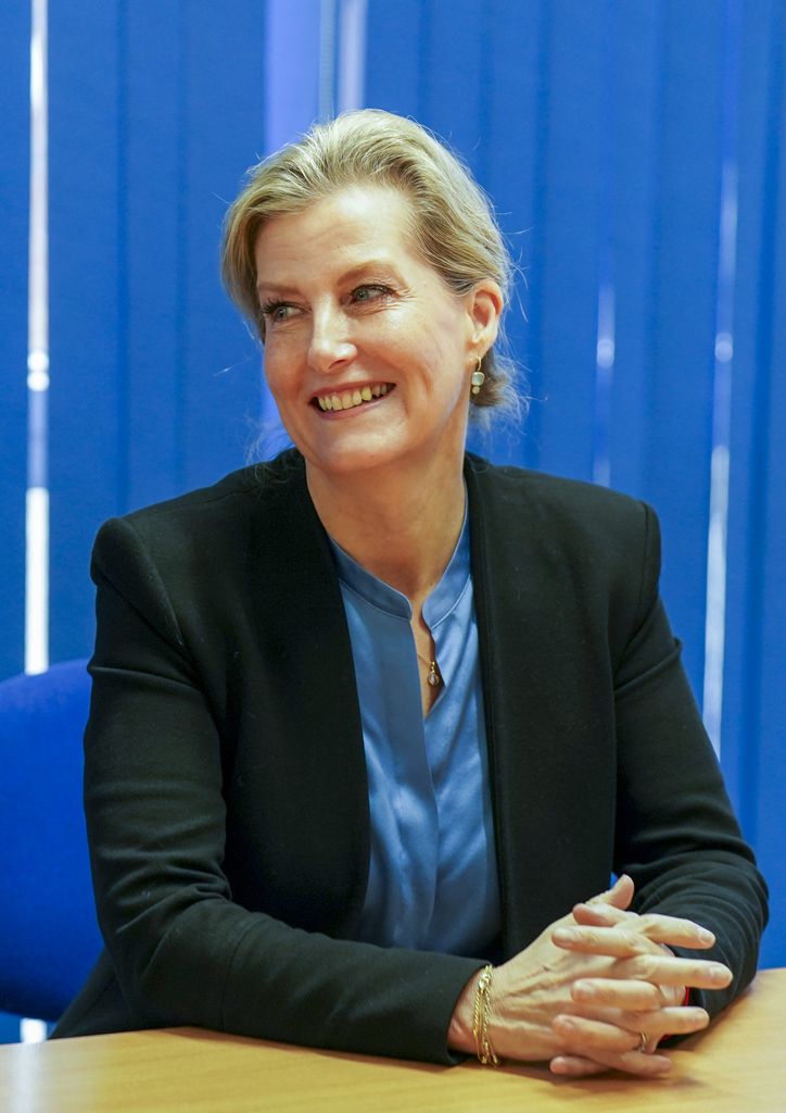 Duchess of Edinburgh wearing black blazer and blue shirt