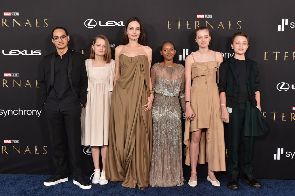 Maddox Jolie-Pitt, Vivienne Jolie-Pitt, Angelina Jolie, Knox Jolie-Pitt, Shiloh Jolie-Pitt, and Zahara Jolie-Pitt attend the Los Angeles Premiere of Marvel Studios' "Eternals" on October 18, 2021 in Los Angeles, California