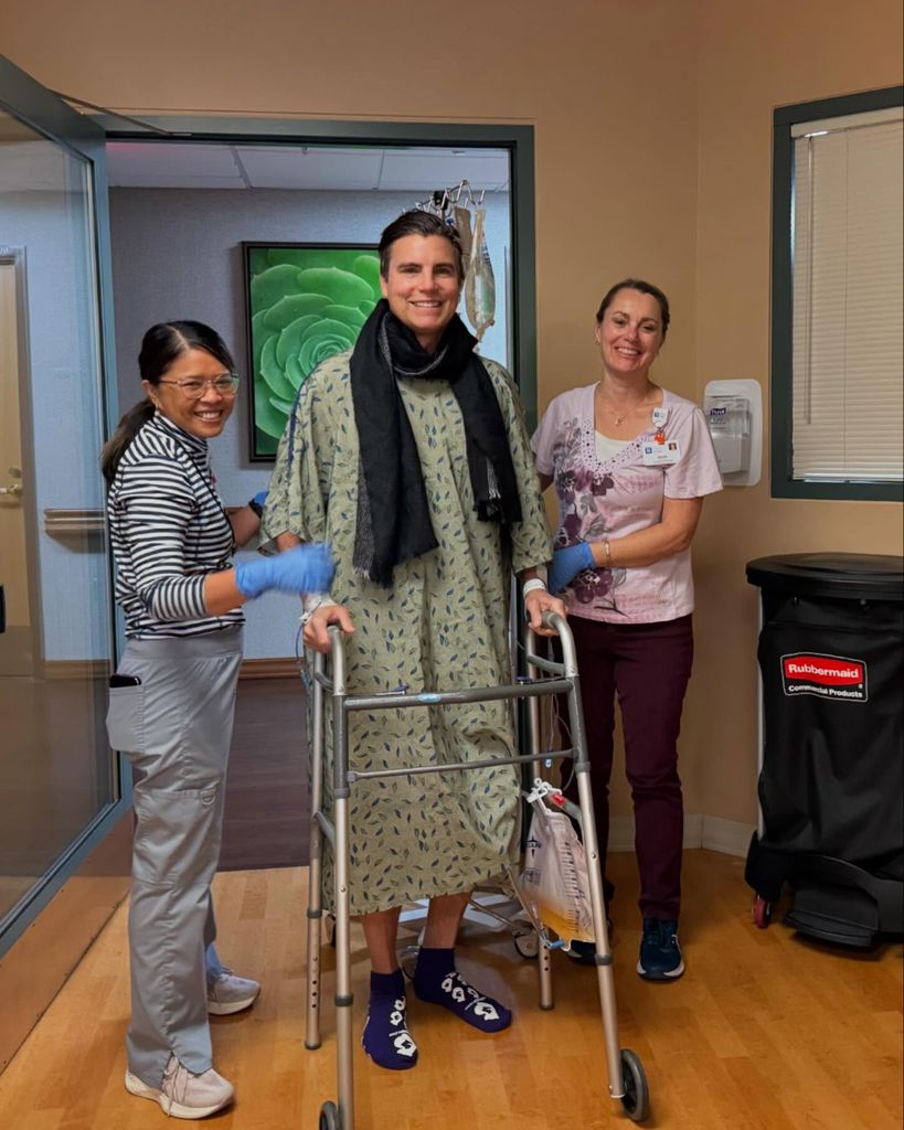 colin egglesfield with a walker in hospital