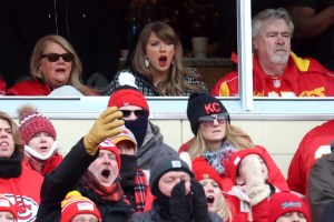 KANSAS CITY, MISSOURI - JANUARY 18: Singer-songwriter Taylor Swift reacts during the first quarter in the AFC Divisional Playoff between the Houston Texans and the Kansas City Chiefs at GEHA Field at Arrowhead Stadium on January 18, 2025 in Kansas City, Missouri. (Photo by Jamie Squire/Getty Images)