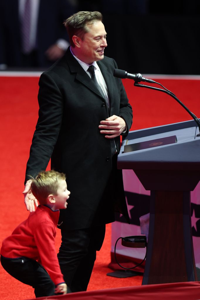 Elon Musk and his son X appear on stage at President-Elect Donald Trump's victory rally 