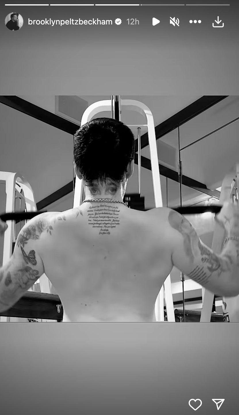 Brooklyn showing off a number of his tattoos while working out