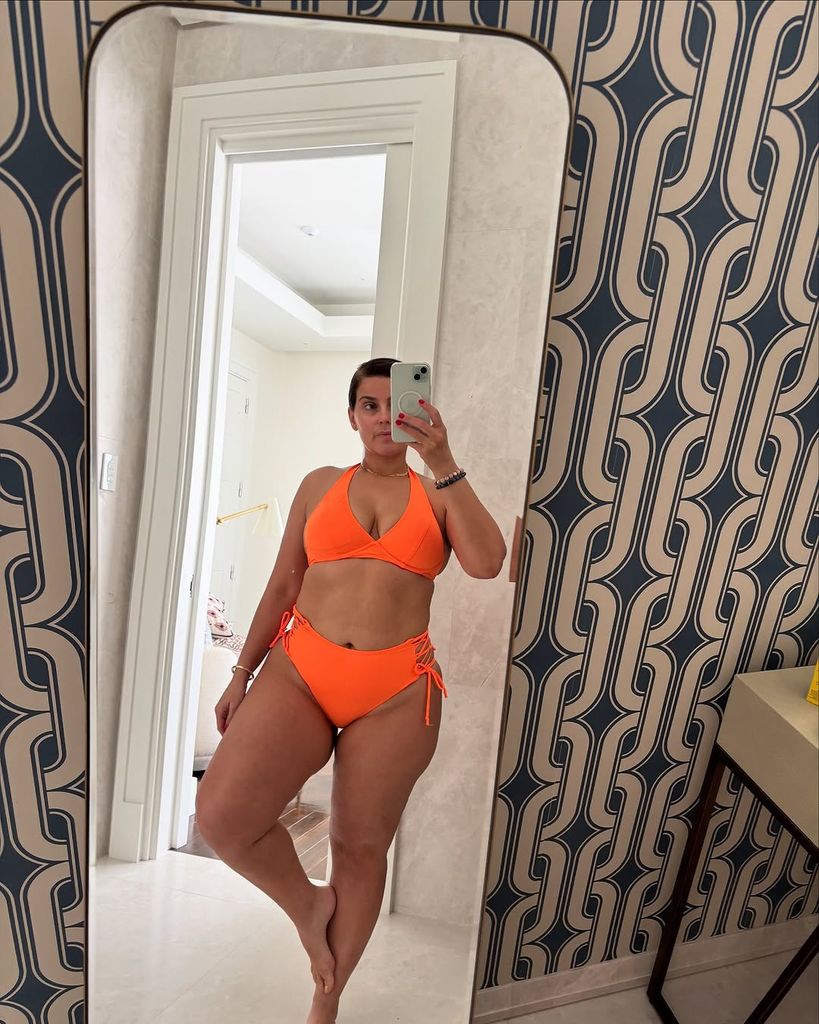 Nelly shares rare bikini snaps