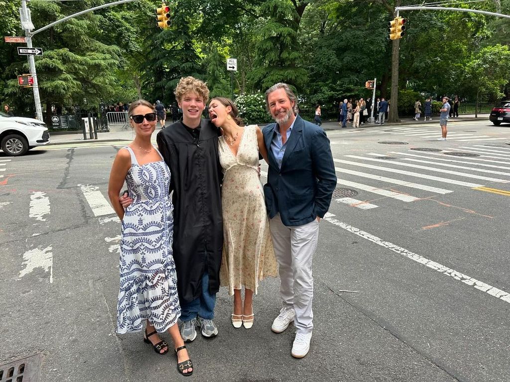 Christy Turlington poses with husband Edward Burns and their children Finn and Grace (second right)