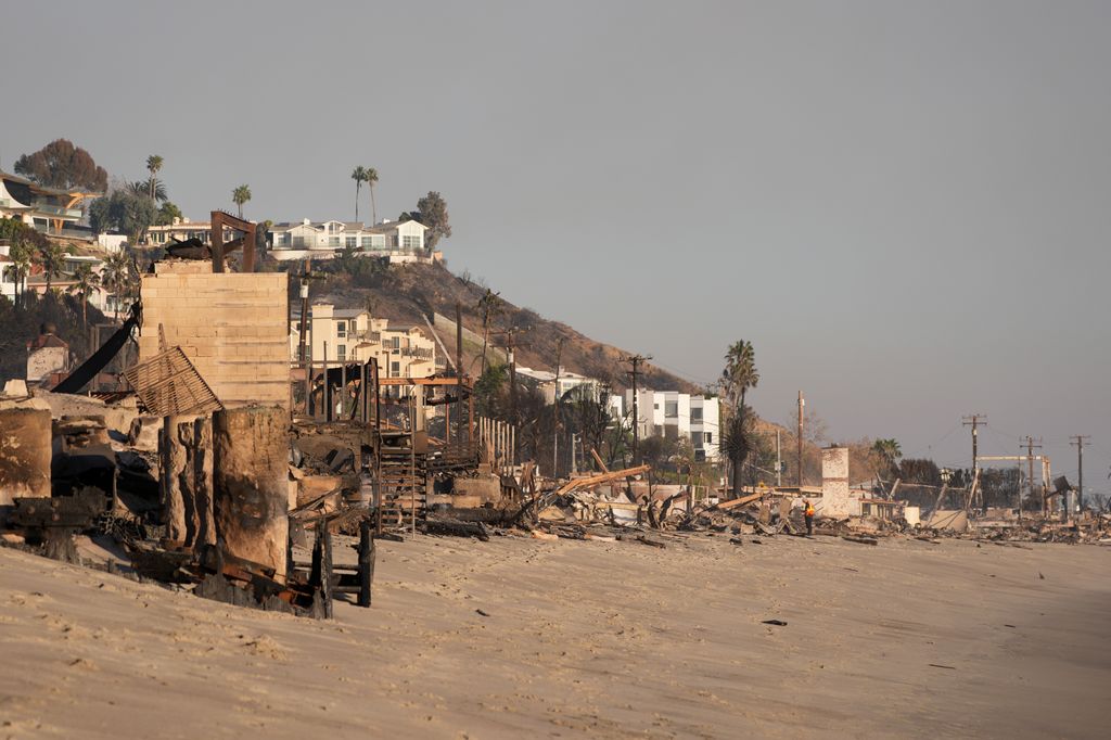 A view of damage on PCH in Malibu as firefighters are still battling to control huge wildfires