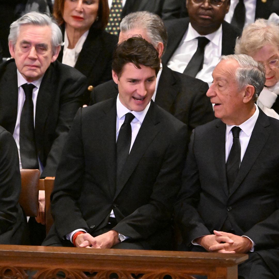 Canadian Prime Minister Justin Trudeau (C) attends the State Funeral Service for former US President Jimmy Carter at the Washington National Cathedral in Washington, DC, on January 9, 2025