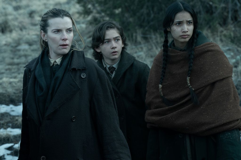 Betty Gilpin as Sara Rowell, Preston Mota as Devin Rowell, and Shawnee Pourier as Two Moons in American Primeval