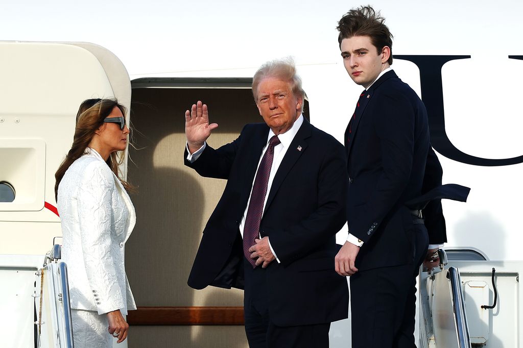 Barron Trump with parents 