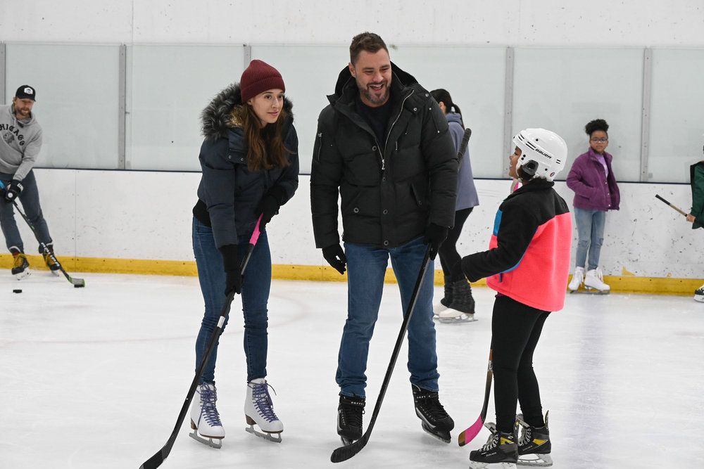 Marina Squerciati as Kim Burgess, Patrick John Flueger as Adam Ruzek and Ramona Edith Williams as Makayla in a still from Chicago PD