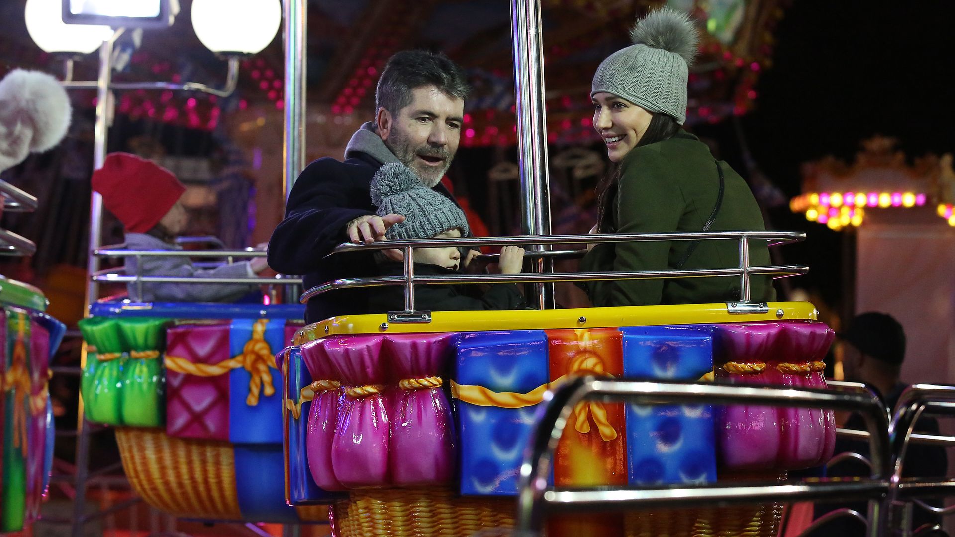 Simon Cowell, Lauren Silverman and Eric on a Winter Winderland ride