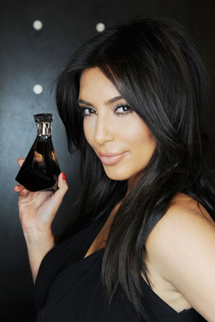 Kim Kardashian with her "True Reflection" Perfume in 2012