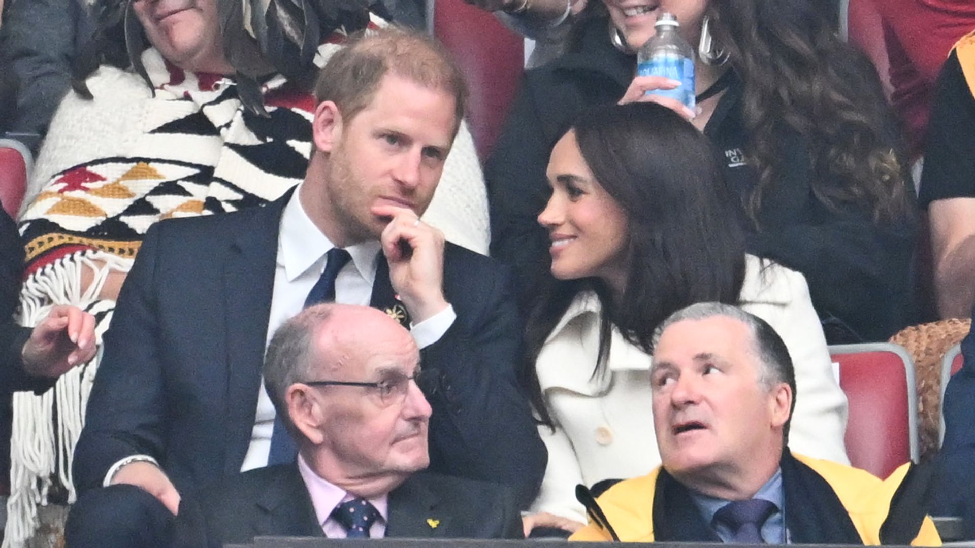 Prince Harry and Meghan Markle talking