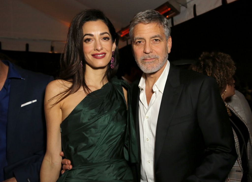 Amal Clooney and George Clooney attends the premiere of Hulu's "Catch-22" on May 07, 2019 in Hollywood, California.\