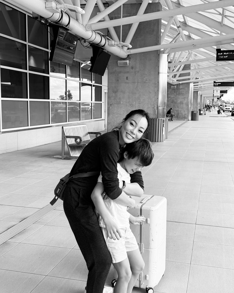 Dara and Wolfie in black and white photo hug