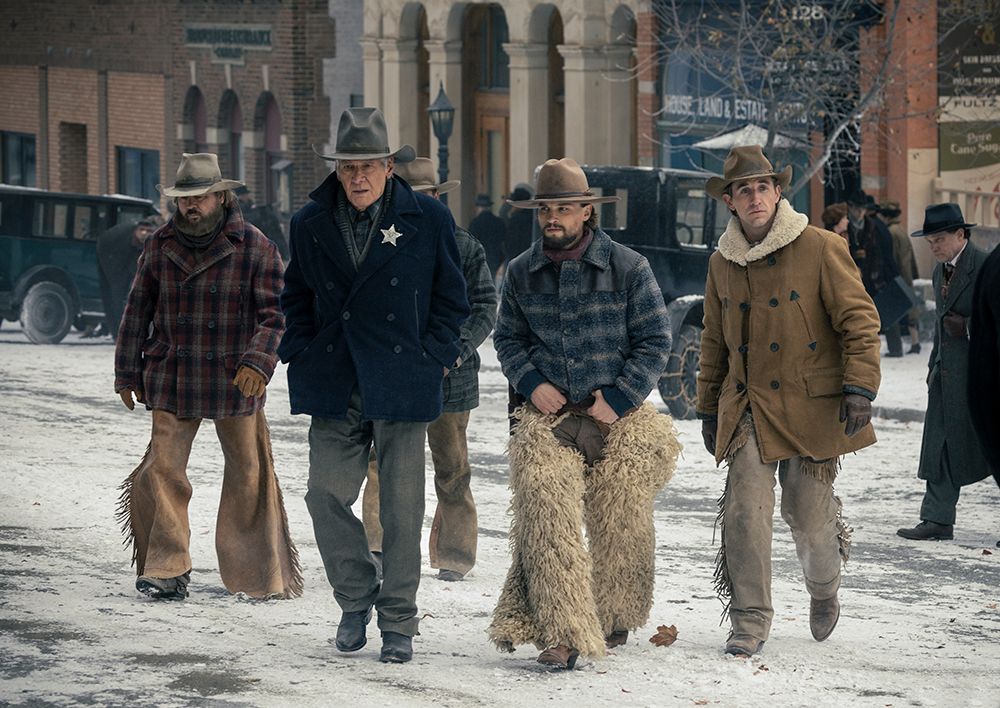 Brian Geraghty walking alongside Harrison Ford in an episode of 1923 