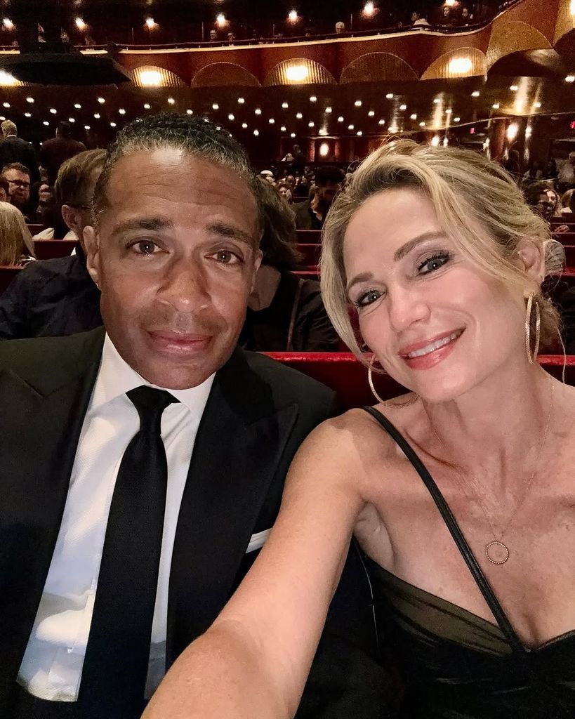 Amy Robach and T.J. Holmes looking serious selfie