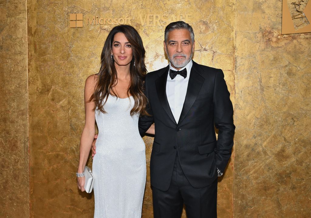 Amal Clooney and husband US actor George Clooney arrive for The Albies hosted by the Clooney Foundation at the New York Public Library in New York City on September 28, 2023