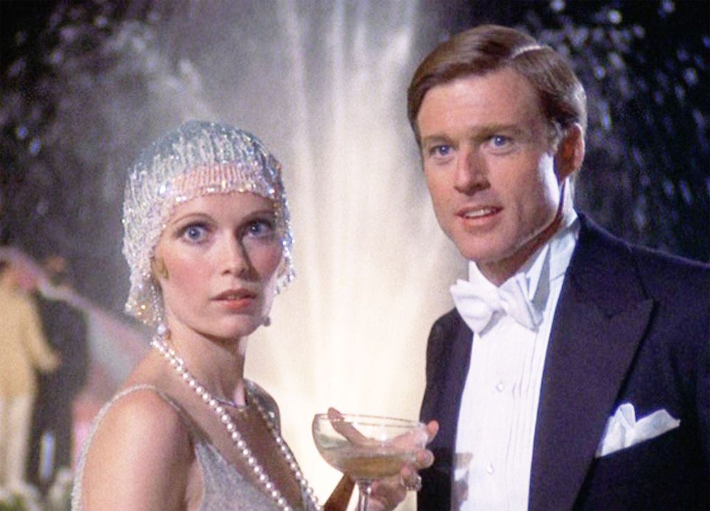 The movie "The Great Gatsby", directed by Jack Clayton, based on the novel by F. Scott Fitzgerald. Seen here from left, Mia Farrow as Daisy Buchanan and Robert Redford as Jay Gatsby. Initial theatrical release March 29, 1974