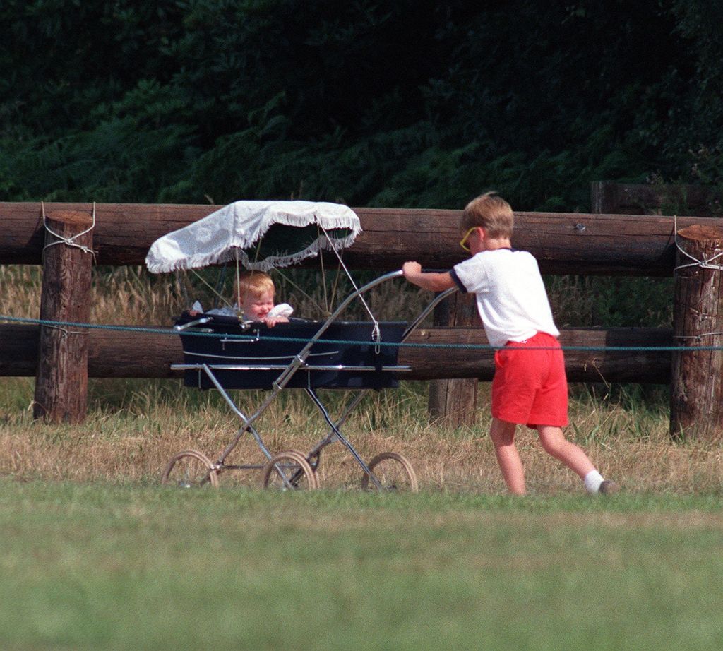 Prince William pushing Princess Beatrice in a pram in July 1989