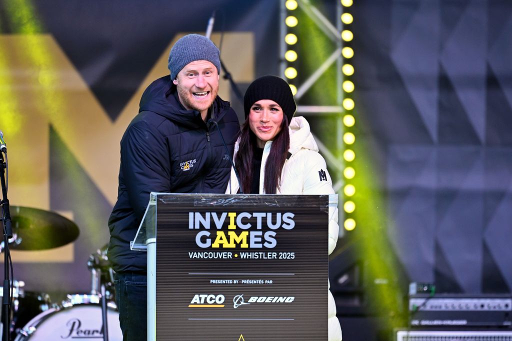  Prince Harry, Duke of Sussex and Meghan, Duchess of Sussex speak on stage at the Whistler Welcoming Ceremony during day two of the 2025 Invictus Games on February 10, 2025 in Whistler, British Columbia. (Photo by Samir Hussein/WireImage)