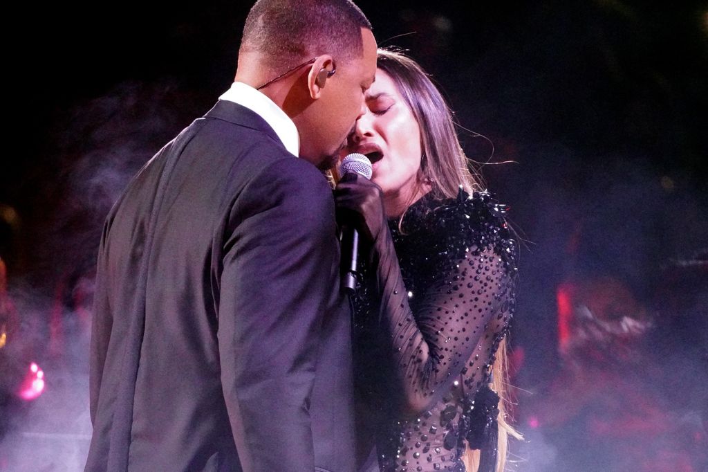 Will Smith and India Martinez perform onstage during Univision's 37th Premio Lo Nuestro at Kaseya Center