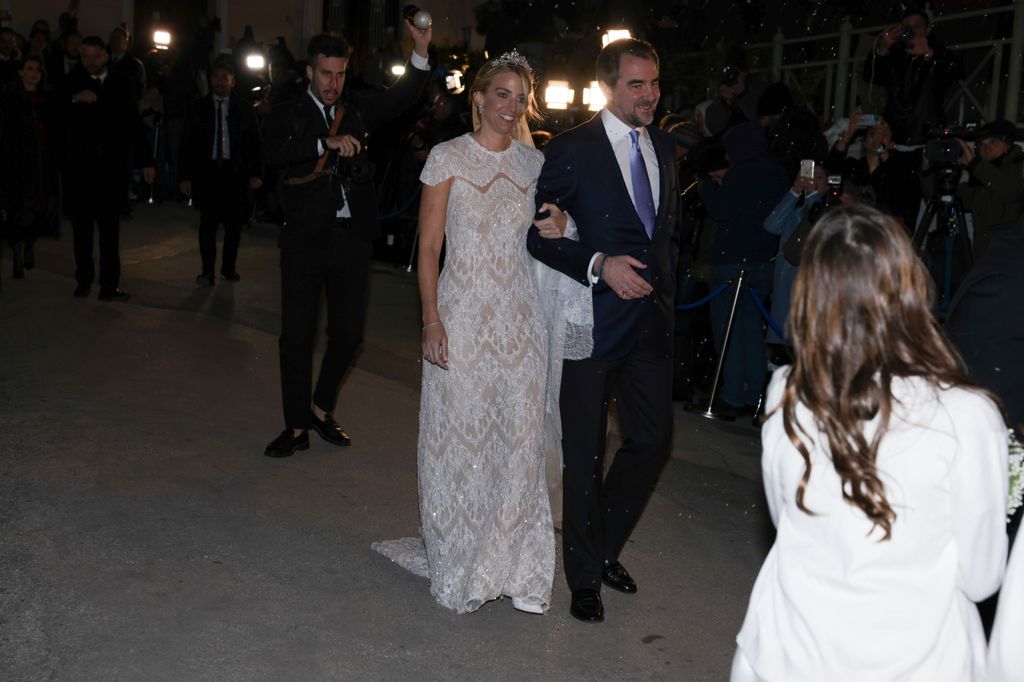 Chrysi Vardinogianni and Prince Nikolaos walking together as a married couple