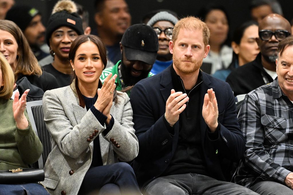 VANCOUVER, BRITISH COLUMBIA - FEBRUARY 09: Meghan, Duchess of Sussex and Prince Harry, Duke of Sussex attend the wheelchair basketball match between the USA v Nigeria during day one of the 2025 Invictus Games at the Vancouver Convention Centre on February 09, 2025 in Vancouver, British Columbia.