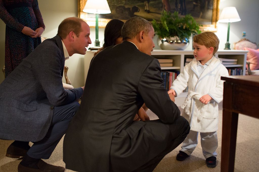 Prince George shaking hands with President Barack Obama in 2016 