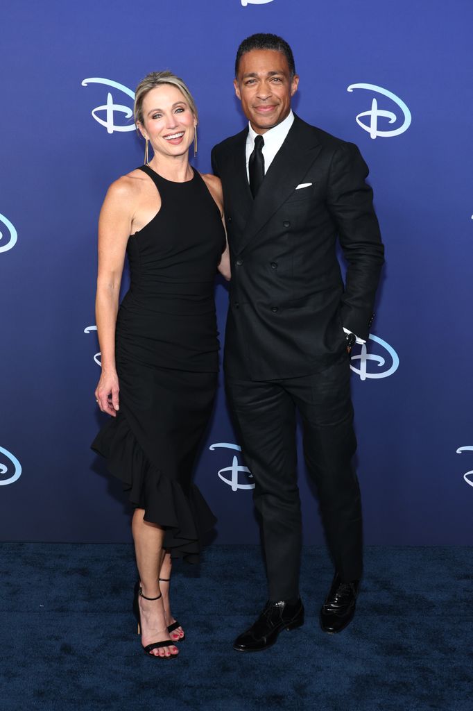 Amy Robach and TJ Holmes attend the 2022 ABC Disney Upfront at Basketball City - Pier 36 - South Street on May 17, 2022 