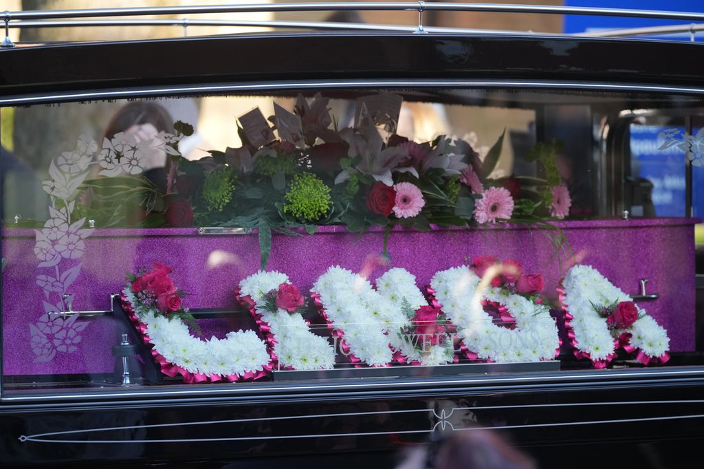  A floral tribute spelling Linda on pink coffin