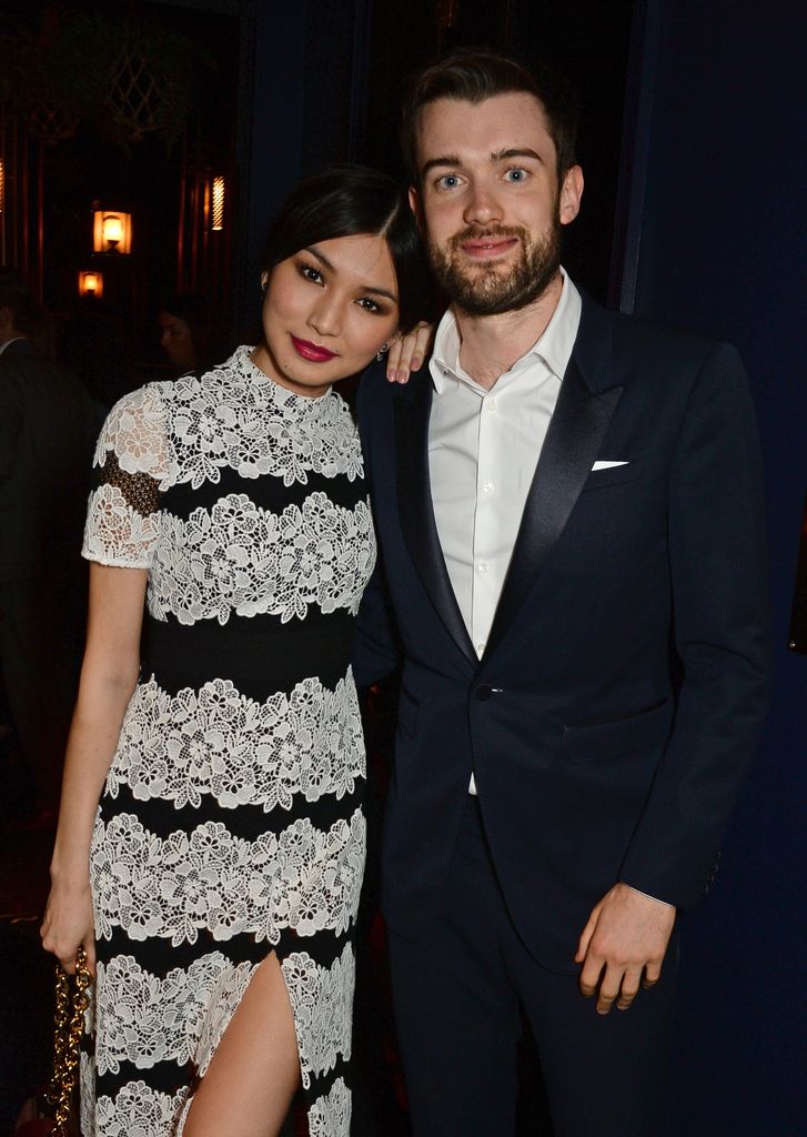 Gemma Chan resting her head on Jack Whitehall's shoulder