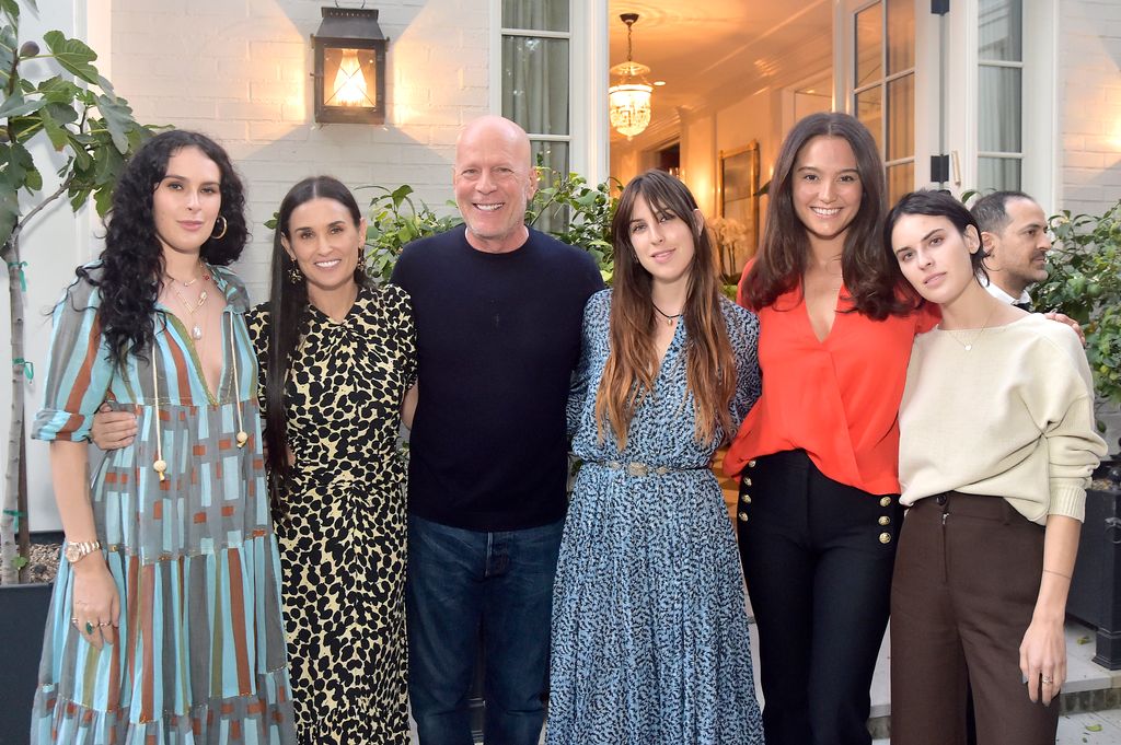 Rumer Willis, Demi Moore, Bruce Willis, Scoutt Willis, Emma Heming Willis and Tallulah Willis standing in a line