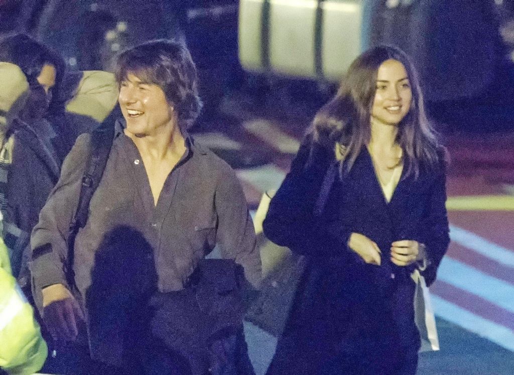 tom cruise and ana de armas smiling 