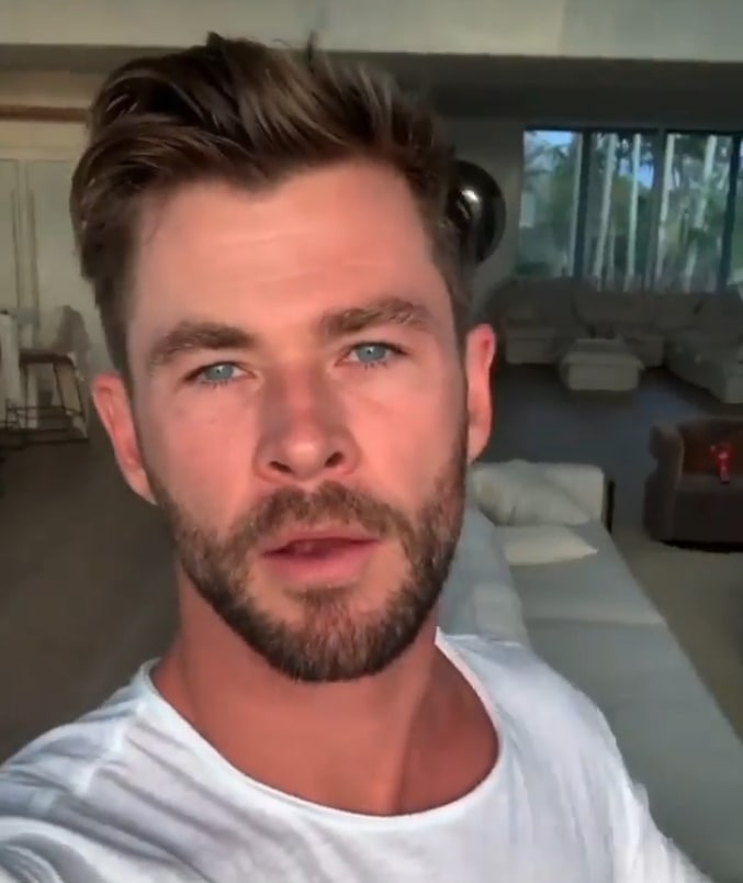 Chris Hemsworth films a video selfie in his living room at his home in Australia