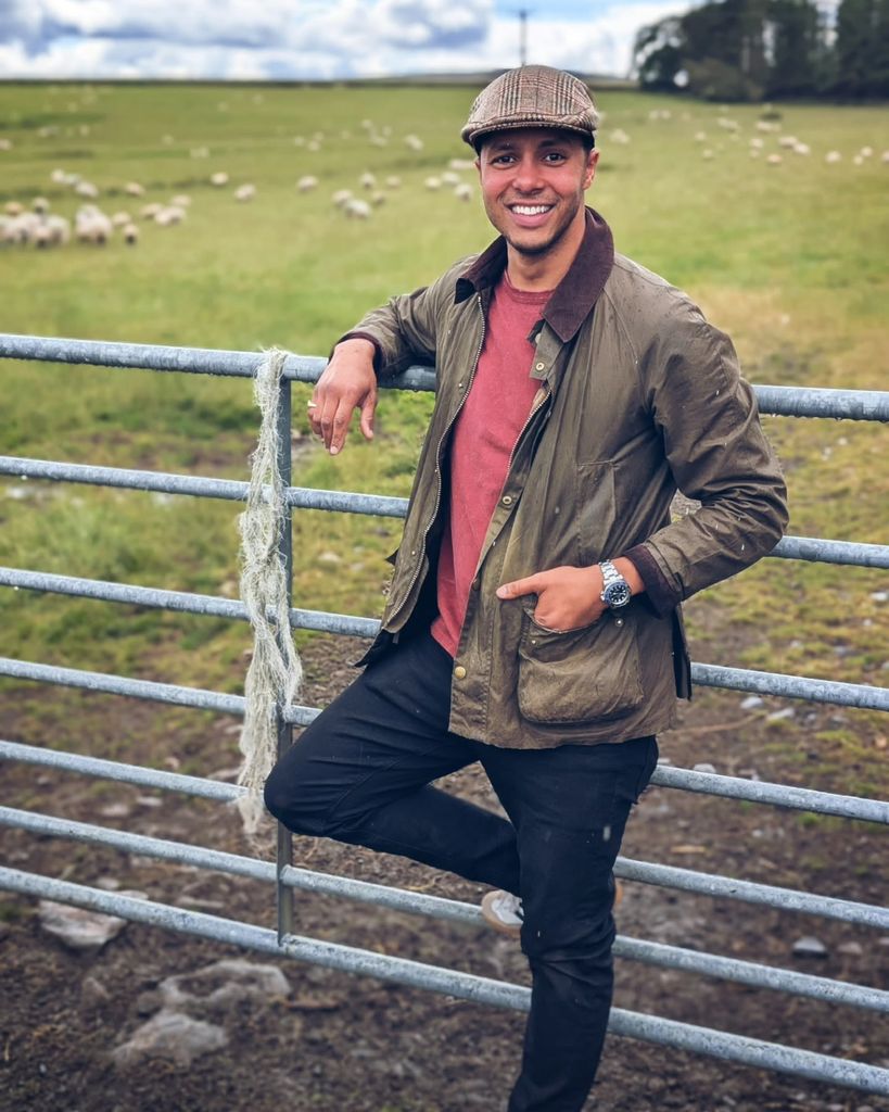 Will Kirk from The Repair Shop in Barbour jacket and flat cap in countryside