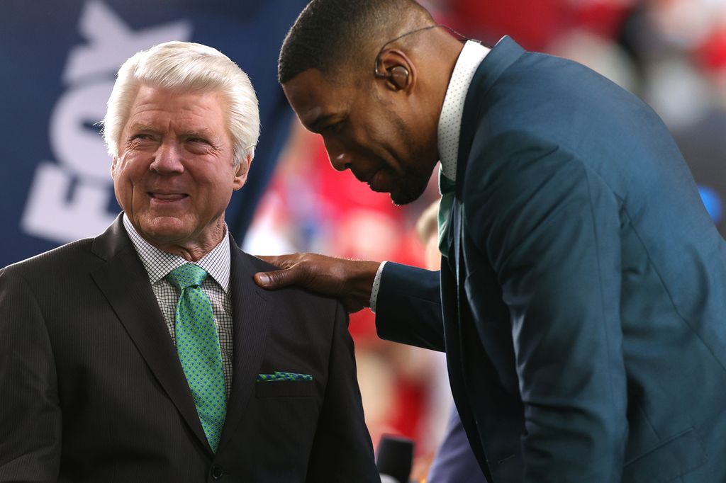 Former NFL head coach and Fox Sports analyst Jimmy Johnson talks with former NFL player and Fox Sports analyst Michael Strahan prior to Super Bowl LIV between the San Francisco 49ers and the Kansas City Chiefs at Hard Rock Stadium on February 02, 2020 in Miami, Florida